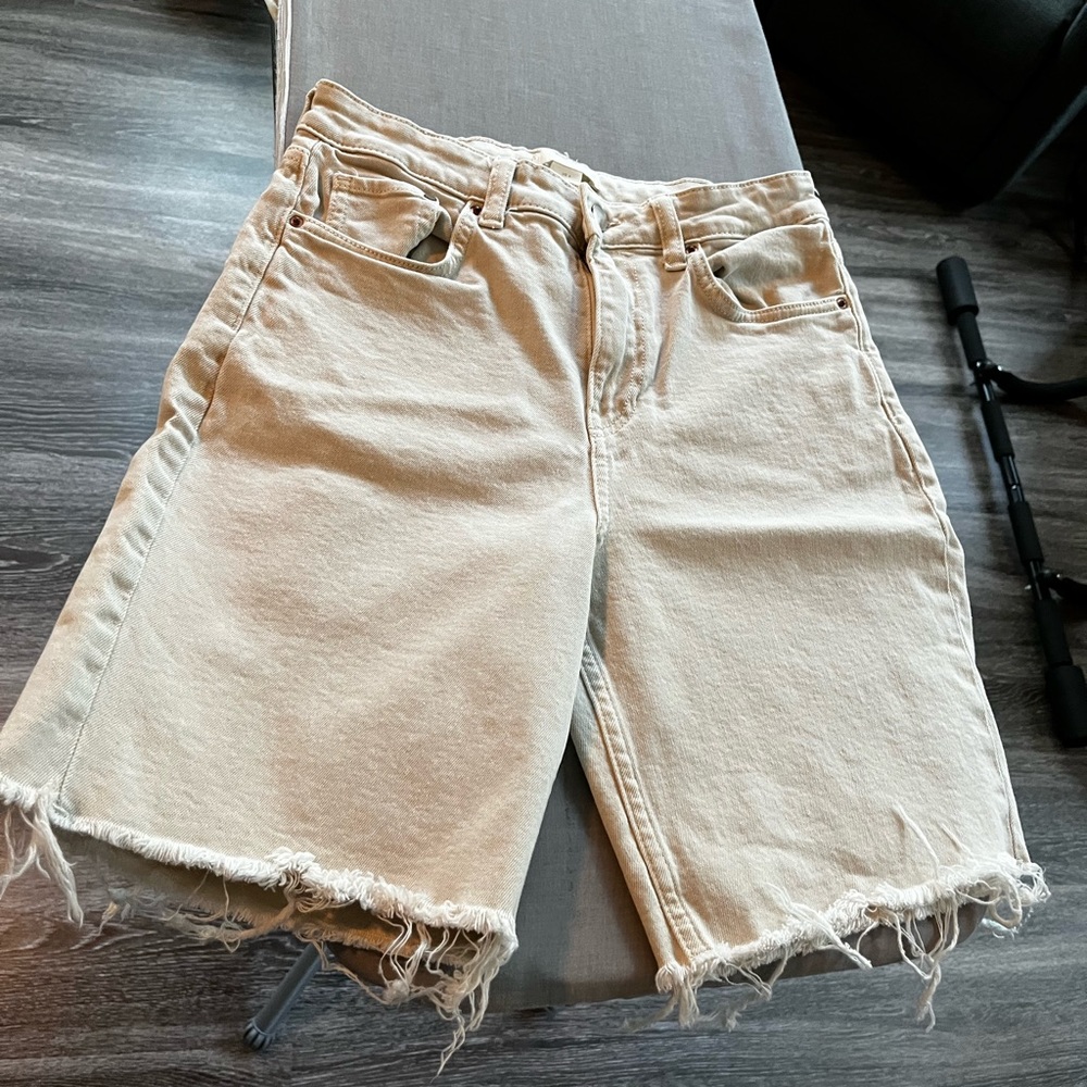Size 27, distressed hem denim shorts